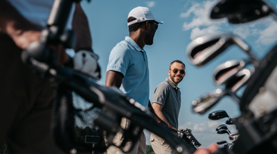 A group of golfers talking