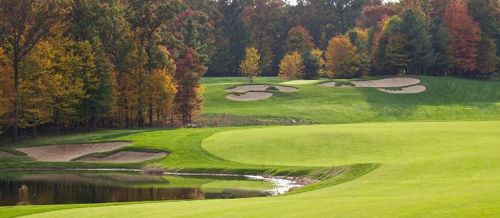 A golf course with a lake